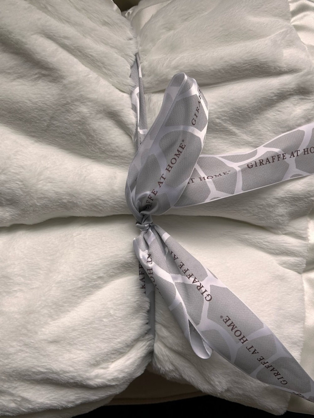 Giraffe at Home White Plush Throw with Branded Ribbon